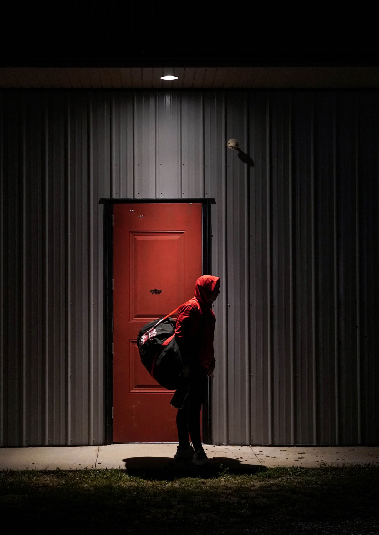 Southern Boone junior Hayden Steelman exits the locker room after the game